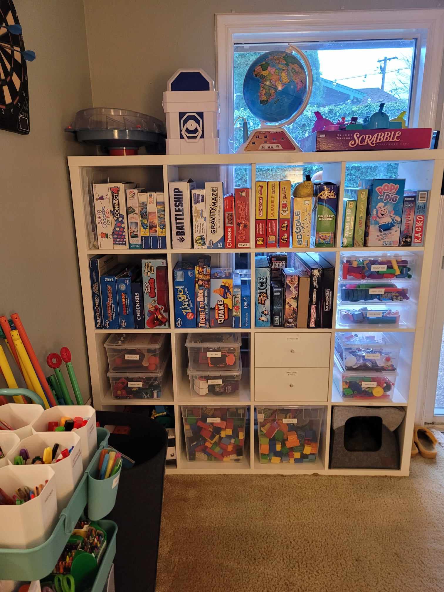 Playroom toy and game shelf organization