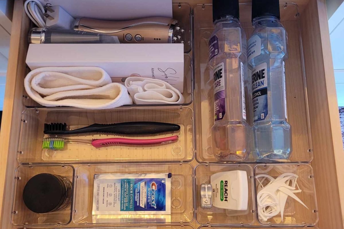 After organization image of bathroom drawer with dental and facial care